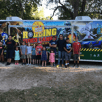 Game Kingz SA Video Games enjoying picture with the Truck